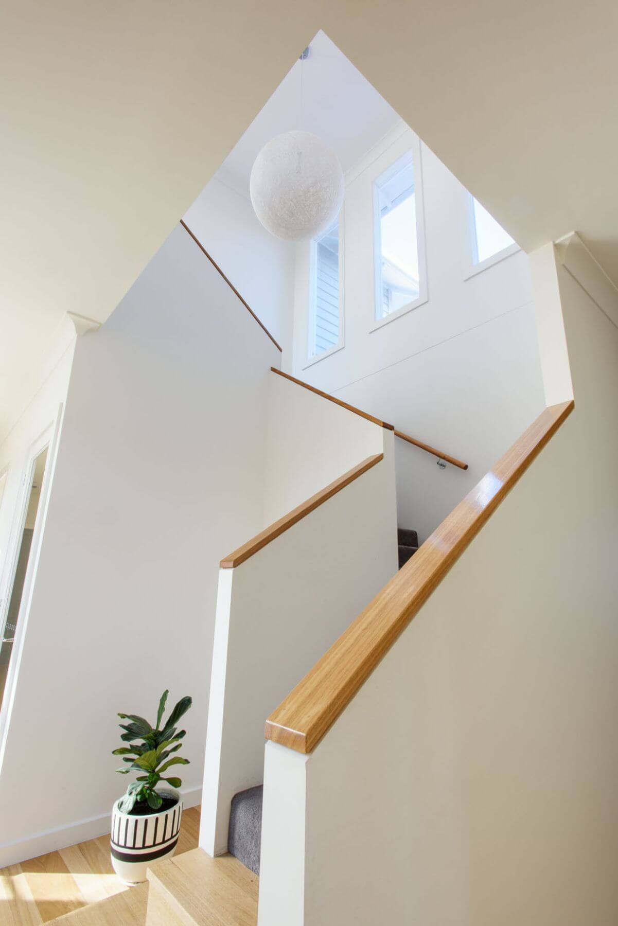 white and wood staircase, Vermont home build, custom home build vermont, Vermont home builders, newly built custom home Vermont